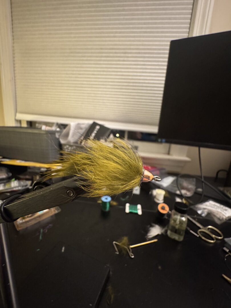 Olive streamer on the vise
